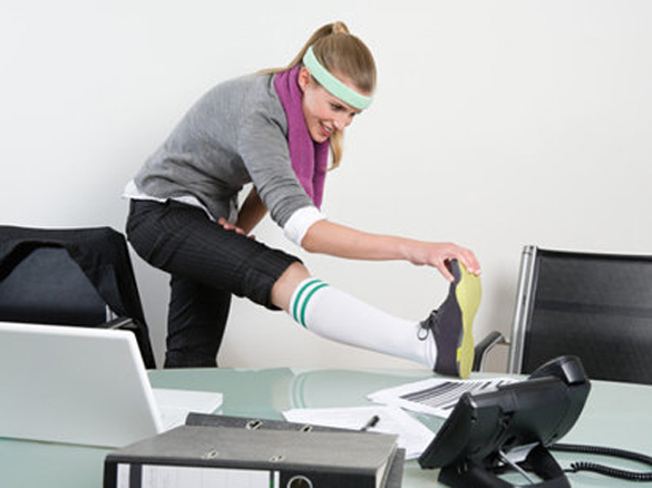 Woman-exercise-in-office